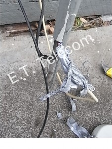 A dodgy phone cable repair hidden inside external conduit